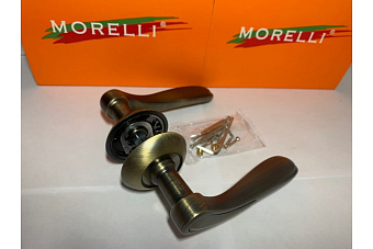 Дверная ручка нажимная MORELLI LONDON EYE MH-26 MAB/AB античная бронза
